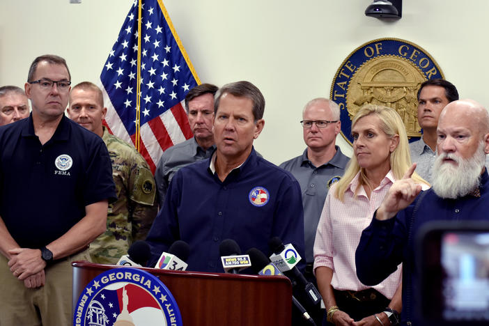 Gov. Brian Kemp delivers a briefing at the Georgia Emergency Management Agency. 
