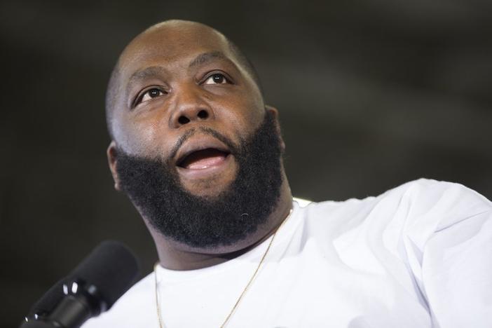 In this Tuesday, Feb. 16, 2016 photo, hip-hop artist and activist Killer Mike speaks during a rally with Democratic presidential candidate Sen. Bernie Sanders, I-Vt., at Morehouse College, in Atlanta.