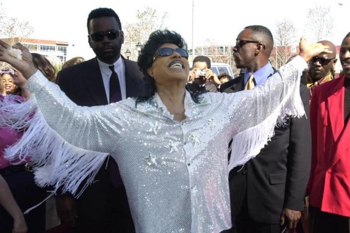 Little Richard greets crowd of well wishers at the historic Douglass Theatre  while in town in 2001 to receive an award.