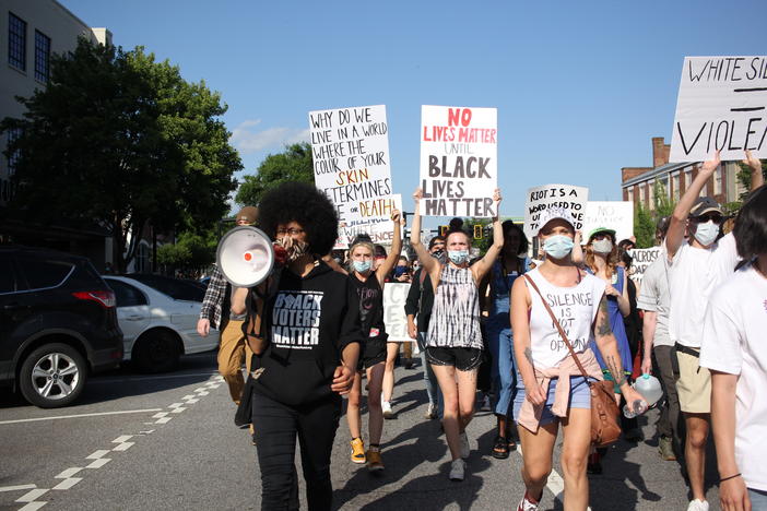 Athens-Clarke County District 2 Commissioner Mariah Parker leads a march in downtown Athens, Georgia, on Sunday, May 31. Parker tested positive for COVID-19 on Wednesday and encouraged fellow protesters to get tested. 