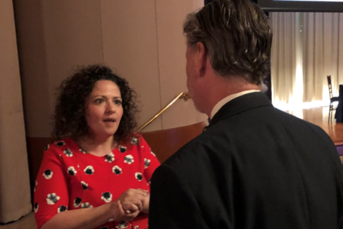 Fulton County School District Director of Student Discipline, Prevention and Intervention Maribel Bell speaks with Clayton County Juvenile Court Judge Steven C. Teske at The Carter Center on Monday, April 15, 2019.