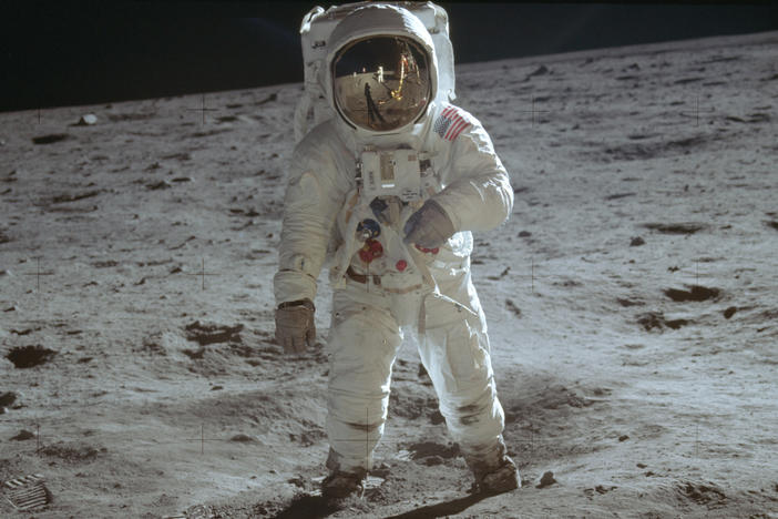 In this July 20, 1969, photo made available by NASA, astronaut Buzz Aldrin, lunar module pilot, walks on the surface of the moon during the Apollo 11 extravehicular activity. 