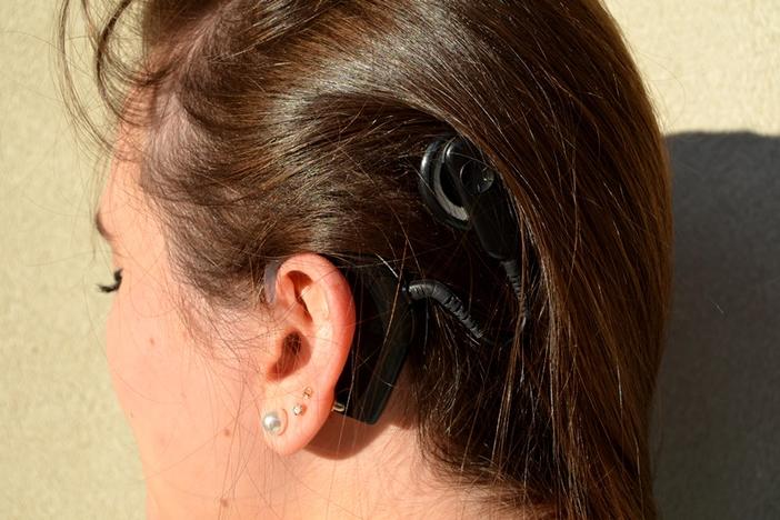 Emory University student Morgan Leahy got a cochlear implant to help with her hearing loss, but she says it's not a replacement. She describes the sound as hollow and robotic, and she has to strain to make out certain words and sounds.