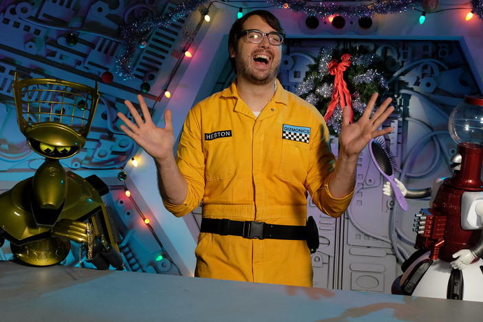 Robots Crow and Tom Servo and their human Jonah Ray in the new Mystery Science Theater 3000 on Netflix.