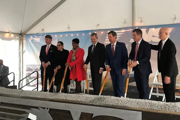 Atlanta Mayor Keisha Lance Bottoms, Gov. Brian Kemp, and Norfolk Southern CEO Jim Squires pose for a picture at the groundbreaking of Norfolk Southern's new headquarters. 