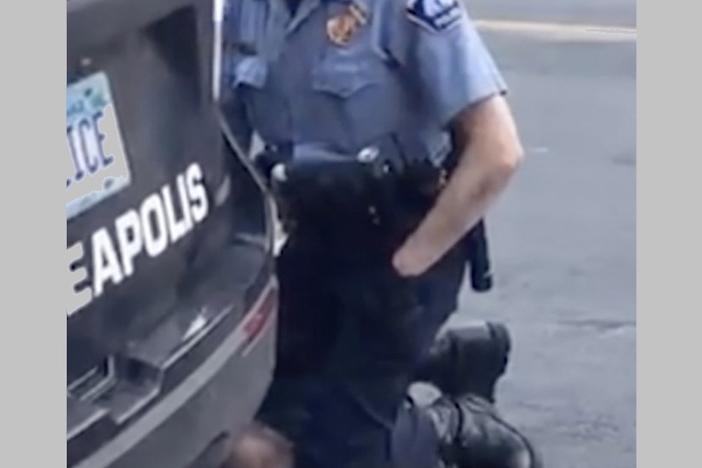 In this Monday, May 25, 2020, frame from video, a Minneapolis officer kneels on the neck of a handcuffed man who was pleading that he could not breathe in Minneapolis. 