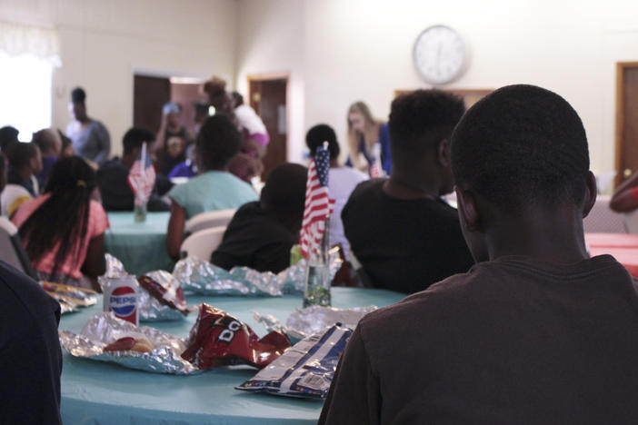 16-year old Otiserion French listens to a presentation at a community youth summit about sex ed, bullying and suicide.