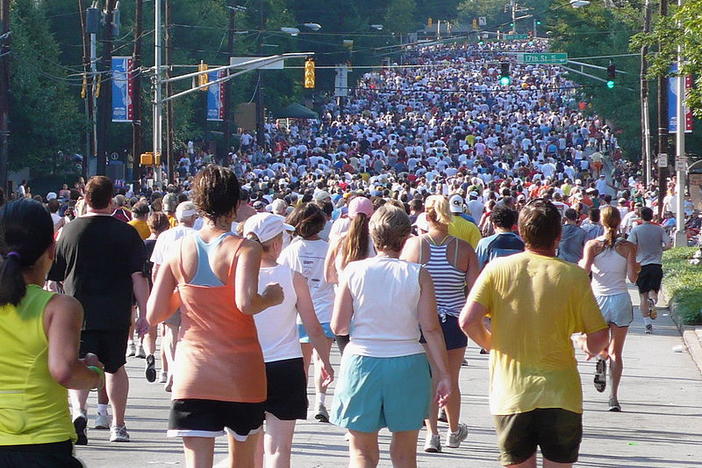 Road closures take effect ahead of the 50th Peachtree Road Race. 