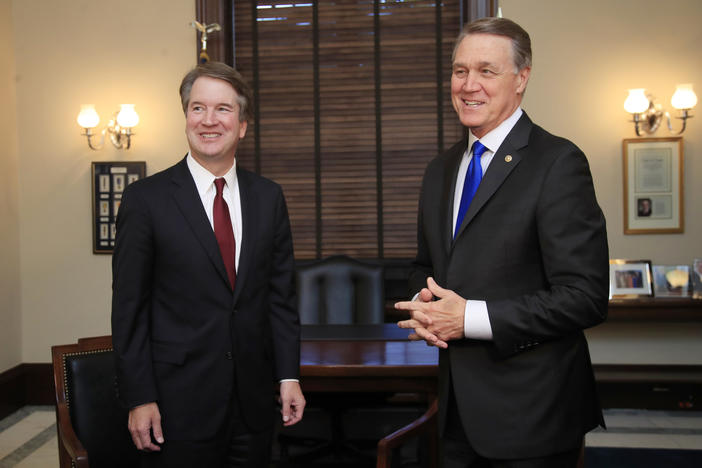 Supreme Court nominee Brett Kavanaugh meets Sen. David Perdue on Capitol Hill in Washington.