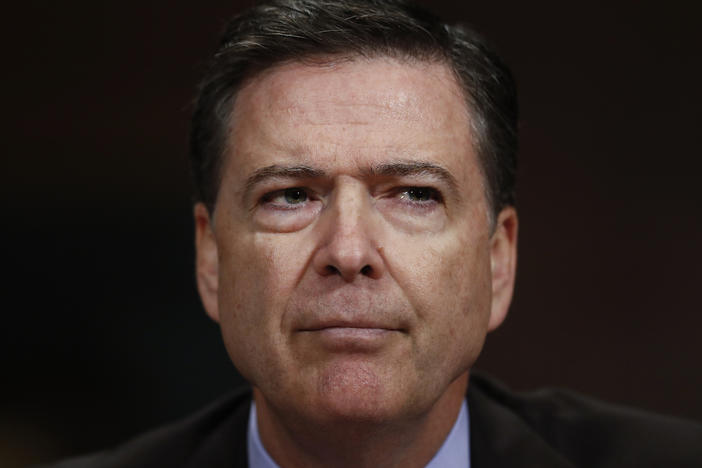 In this May 3, 2017, photo, then-FBI Director James Comey pauses as he testifies on Capitol Hill in Washington, before a Senate Judiciary Committee hearing. 