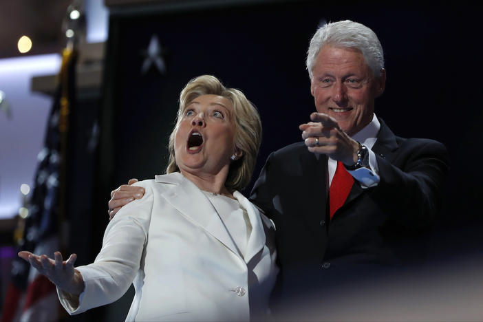Democratic presidential nominee Hillary Clinton and Former President Bill Clinton react as balloons fall during the final day of the Democratic National Convention in Philadelphia, Thursday, July 28, 2016.