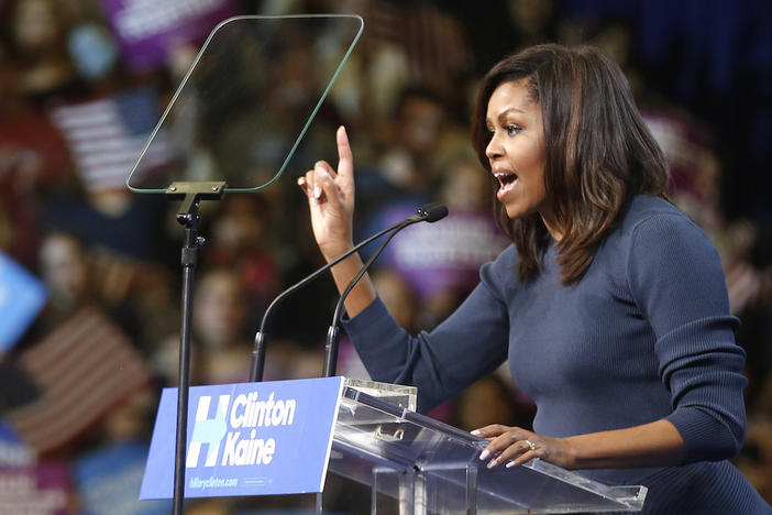 First lady Michelle Obama speaks during a campaign rally for Democratic presidential candidate Hillary Clinton Thursday, Oct. 13, 2016, in Manchester, NH.