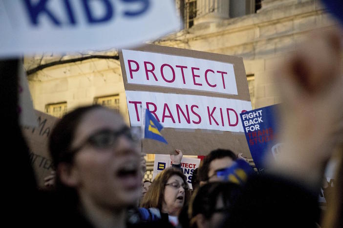 Activists and protesters with the National Center for Transgender Equality rally in front of the White House, Wednesday, Feb. 22, 2017, in Washington, D.C.