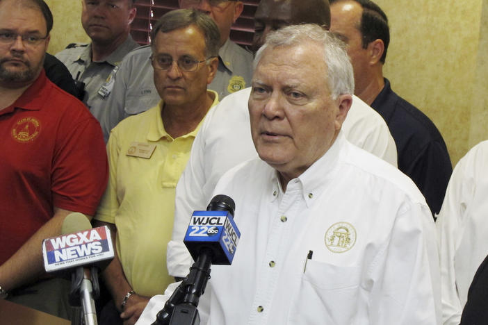 Georgia Gov. Nathan Deal speaks to reporters after surveying storm damage from Irma on Thursday, Sept. 14, 2017, at the airport in Brunswick, Ga. Deal described Irma as a "catastrophic event" for the Georgia coast.