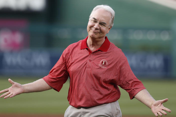 Secretary of Health and Human Services Tom Price reacts after throwing out the ceremonial first pitch before the start of a baseball game between the Washington Nationals and the Miami Marlins, Wednesday, Aug. 9, 2017, in Washington. 