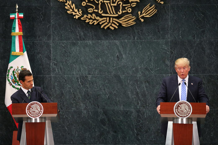 Republican presidential nominee Donald Trump, right, speaks during a joint statement with Mexico President Enrique Pena Nieto, left, at Los Pinos, the official presidential residence, in Mexico City, Wednesday, Aug. 31, 2016.