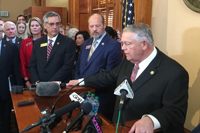 Secretary of State Brad Raffensperger and Rep. Barry Fleming (R-Harlem) look on as House Speaker David Ralston (R-Blue Ridge) answers questions about HB 316, a bill that would overhaul Georgia's election system.