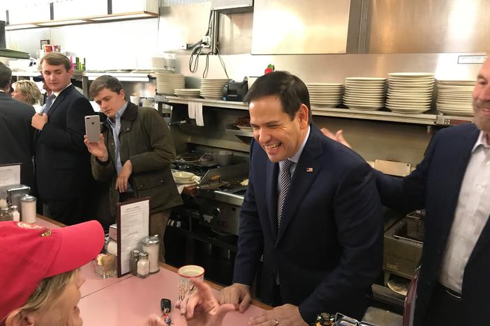 Florida Senator Marco Rubio chats with a patron at the White House restaurant in Buckhead.