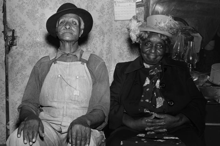 In a photo from the Shipp Studio Archive, a man and woman sit for their portrait in rural Tennessee.