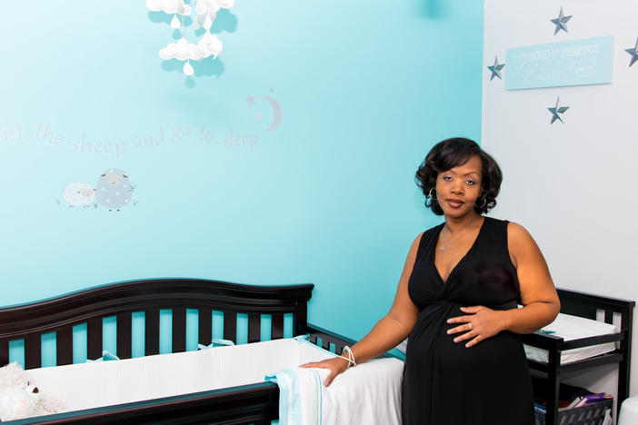 Shalon Irving of Sandy Springs, Georgia poses in a nursery while pregnant with her daughter, Soleil. On January 28, 2017, she died from complication of childbirth. Her mother is now raising her daughter.