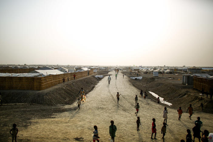 A dirt road cuts through a sprawling Doctors Without Borders camp in South Sudan. In a letter, 1,000 current and former employees are accusing the aid group of racism and white supremacy.