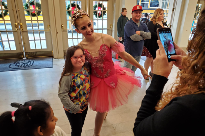 Sugar Plum Fairy Madison Lynn poses for a photo with one of the children who attended the Savannah Ballet Theatre's low-sensory performance of the Nutcracker.