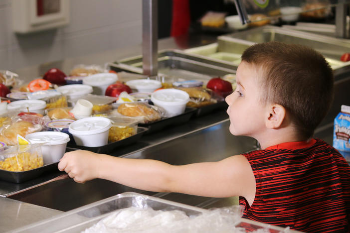 The Macon-Bibb County School System is serving hot meals to food insecure kids in hopes that will lure more families to their summer food program. 