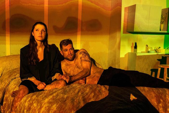 Actors Rebeca Robles and Joe Sykes photographed on set for "The Hero's Wife." 