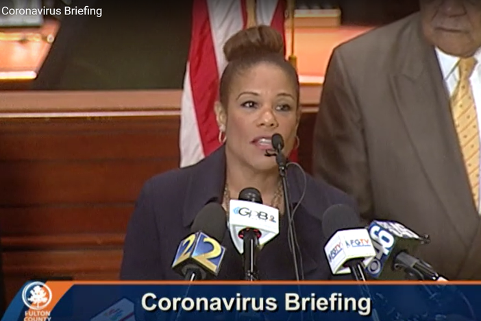Fulton County health director Elizabeth Ford speaks during a news briefing on Tuesday to update the two confirmed cases of COVID-19, the first in Georgia. 