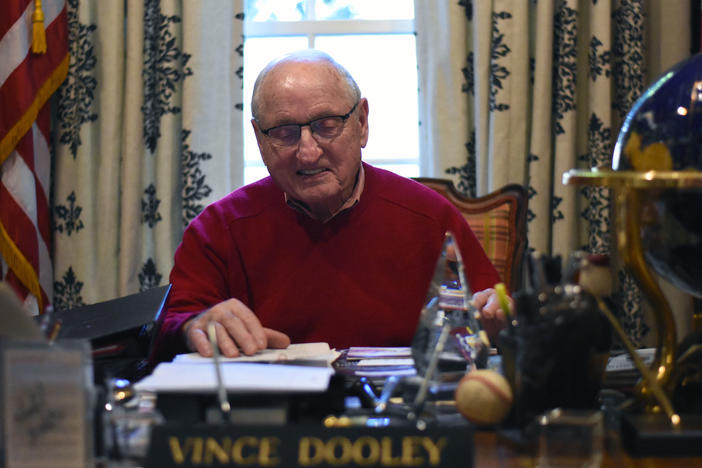 Former UGA football coach Vince Dooley sits at his desk in his Athens, Ga. home.