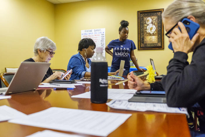 Volunteers in Stacey Abrams Macon office try to call provisional voters before 5 p.m. deadline to cast those votes