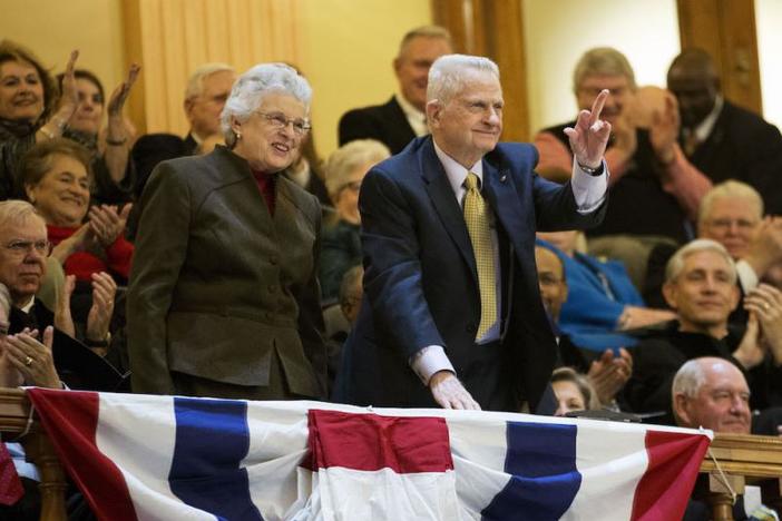 Former Georgia Governor Zell Miller, right, waves when acknowledged with wife Shirley during an inaugural ceremony for Georgia Gov. Nathan Deal at the state Capitol, Monday, Jan. 12, 2015, in Atlanta.