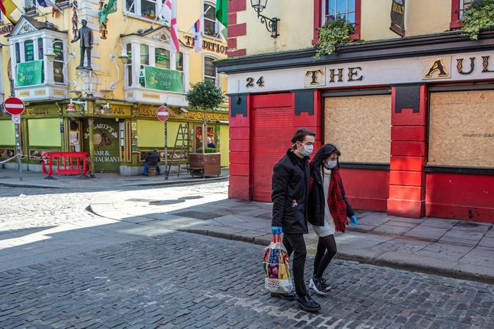 Bars, like this boarded-up pub in Dublin, closed in March. They can open their doors again in Phase Four of Ireland's reopening plan, which is newly delayed until  August.