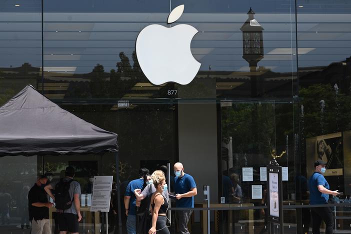 People enter an Apple Store at  in Glendale, Calif., on June 23.The second-highest court in the European Union says Ireland's tax break for Apple did not represent an unfair advantage.