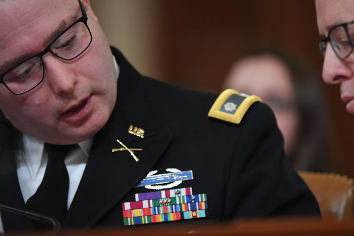 National Security Council Europe expert Lt. Col. Alexander Vindman (left) appears before the House Intelligence Committee during an impeachment hearing in November.