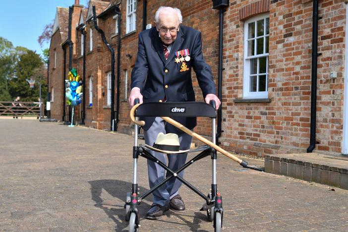 British World War II veteran Capt. Tom Moore raised more than $40 million for health care workers by walking laps in his garden in the weeks leading up to his hundredth birthday in April. He will be knighted in a private ceremony with Queen Elizabeth on Friday.