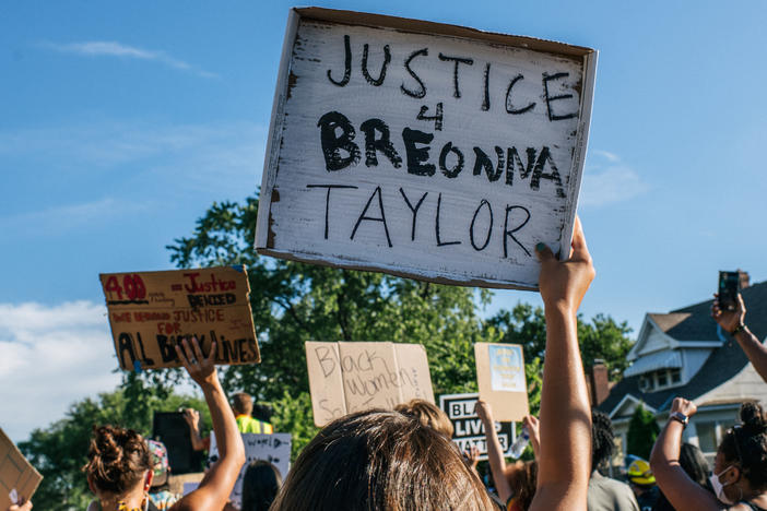 People march in the streets during a demonstration on June 26 in Minneapolis, Minn.  The march honored Breonna Taylor, who was shot and killed by members of the Louisville Metro Police Department on March 13.