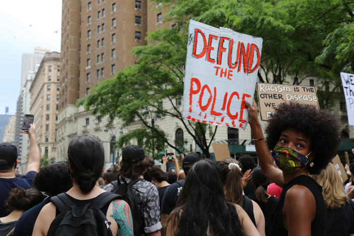 Protestors march in New York on June 6, 2020. Since George Floyd's killing, police departments have banned chokeholds, Confederate monuments have fallen and officers have been arrested and charged following a nationwide outcry against violence by police.+