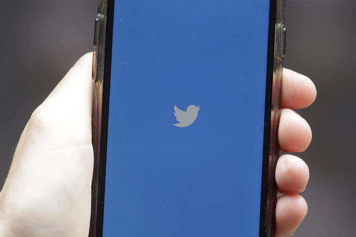 Twitter on Tuesday said it is taking sweeping action against the conspiracy theory QAnon, removing more than 7,000 accounts associated with the group and banning links related to QAnon on the platform.
