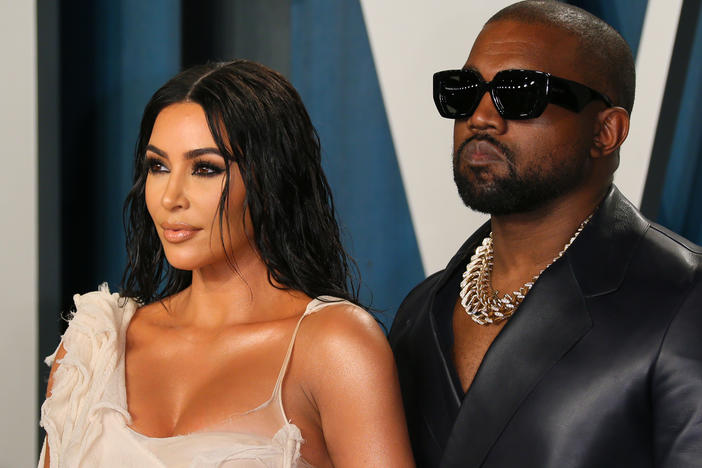 In a string of deleted tweets, rapper Kanye West claimed that his wife Kim Kardashian was trying to get him hospitalized, following a campaign rally he held on Sunday.
