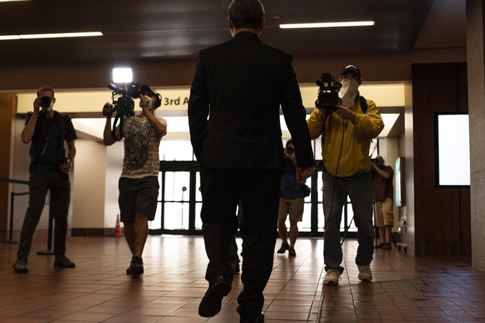 Former Minneapolis Police officer Tou Thao — one of the four ex-officers facing criminal charges in the death of George Floyd — was met by members of the press after a hearing at the Hennepin County Government Center in Minneapolis, at which Judge Peter Cahill lifted a gag order preventing involved parties from speaking publicly about the case.