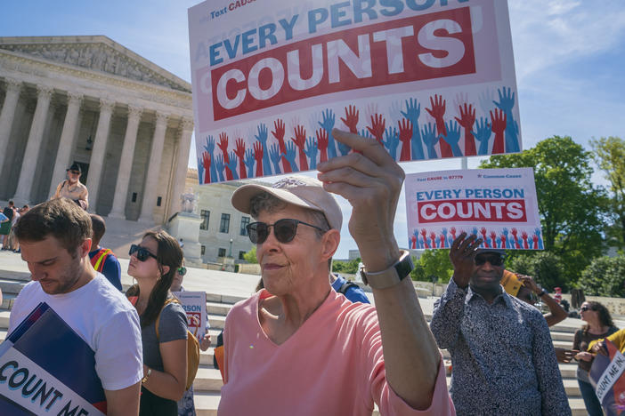 Demonstrators rally outside the U.S. Supreme Court in April 2019 to protest against the Trump administration's efforts to add the now-blocked citizenship question to the 2020 census.