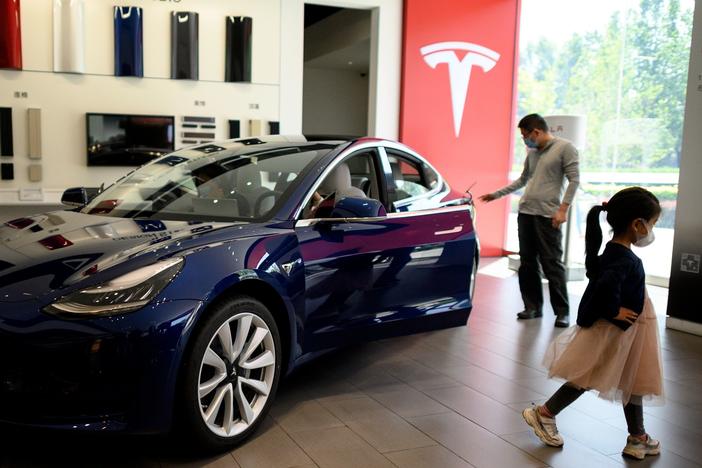 A Tesla car is on display at a showroom in Beijing on May 10. Tesla's stock has soared from $430 a share at the start of 2020 to nearly $1,600 at Wednesday's close.