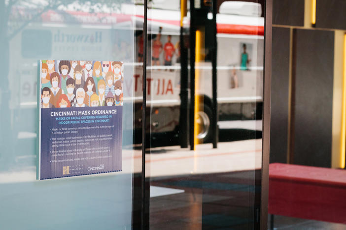 Signs advertise a local mask ordinance in Cincinnati, Ohio, earlier this month. Beginning Thursday evening, masks will be mandatory in public places statewide.