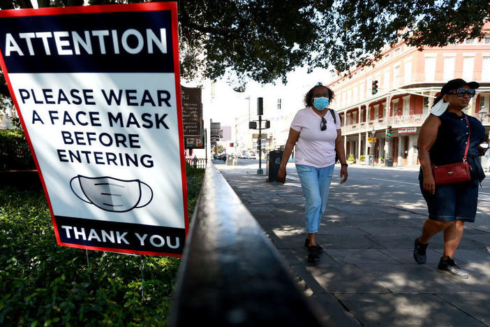 Scientists estimate that near-universal mask use could make a major difference in bringing down coronavirus infections in the United States.