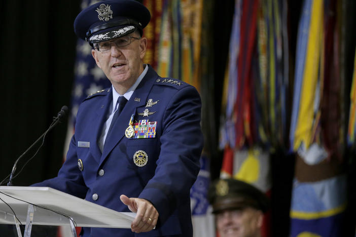 Air Force Gen. John Hyten speaks at Offutt Air Force Base in Nebraska during a change of command ceremony at U.S. Strategic Command in November. Joint Chiefs Chairman Gen. Mark Milley is behind, listening. Hyten is now vice chairman of the Joint Chiefs of Staff.