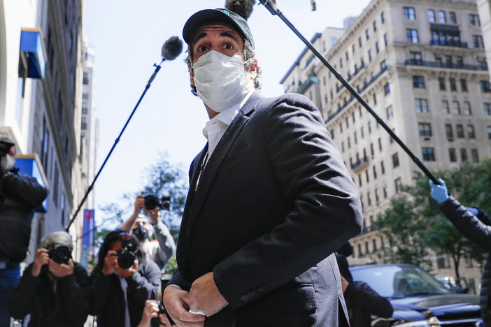 A federal judge found that Michael Cohen's return to prison earlier this month was a violation of his First Amendment rights. Cohen, shown here on release in May, had previously been granted home confinement due to coronavirus concerns.