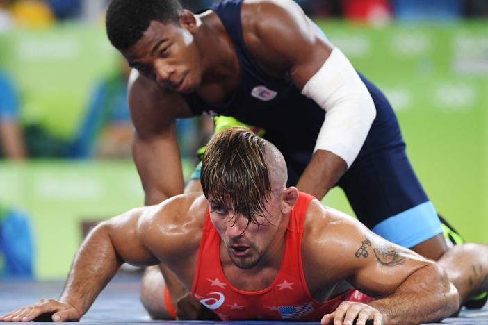 U.S. wrestler Frank Molinaro (red) battles Italy's Frank Chamizo Marquez in the 65-kg (143 pound) bronze medal bout at the 2016 Summer Olympics in Rio de Janiero.  Molinaro, who lost to Marquez, recently retired from the sport when the 2020 Olympics were postponed for a year because of the coronavirus outbreak.