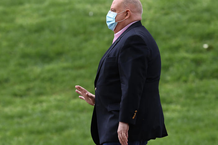 Maryland Gov. Larry Hogan arrives for a coronavirus briefing in front of the Maryland State House on April 17. Hogan's book <em>Still Standing </em>is out Tuesday.