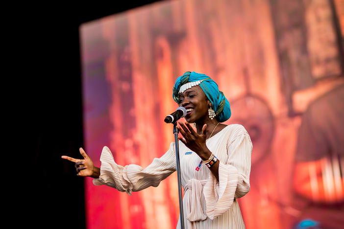 Slam poet and UNHCR Goodwill Ambassador Emi Mahmoud performs at the Sziget Festival in Hungary in 2019.